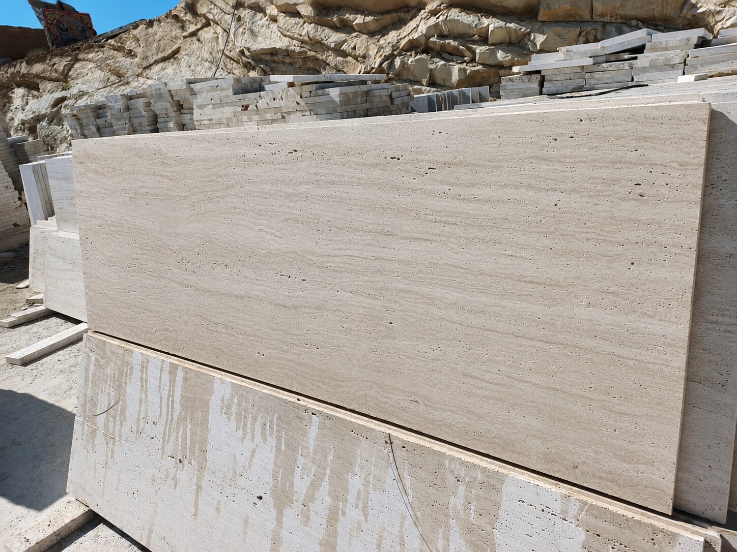 Beige Travertine slabs at the quarry - Marble Fort